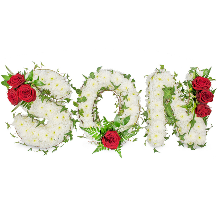 A striking and intimate floral tribute spells SON in clear, capital letters against a pristine white background, the composition inviting close, compassionate attention. Each letter is meticulously built from a thick, carpeted mass of small white spray chrysanthemums whose tightly packed, ruffled petals create a soft, cushion-like plane; the chrysanthemums' texture reads as both refined and consolatory, a traditional choice that conveys purity and respectful remembrance. Lush sprigs of ivy are artfully interlaced through the letters, their trailing stems and deep green leaves providing graceful lines of contrast that accentuate the letters' shapes and add the symbolism of enduring life. The arrangement's emotional punctuation comes from clusters of deep red roses placed with considered precision: the S features three full blooms nestled into its upper left curve with complementary dark foliage; the O is marked by a single, prominent red rose at its bottom centre, framed by delicate fern-like greens; and the N displays a vertical group of three red roses along its right-hand side, their saturated colour drawing the eye upward. Soft, even lighting in the image highlights the chrysanthemums' creamy tones and the roses' velvety surfaces, while a gentle floral scent - the cool, green freshness of chrysanthemums softened by the rose's deeper sweetness - can almost be imagined. Designed for use as a bereavement floral, funeral letter tribute or sympathy display, this piece is suited to services around Cranford Park, local churches, or graveside settings along the nearby High Street; it speaks of intense love and quiet dignity, an enduring way to honour a beloved son and offer comfort to grieving families.