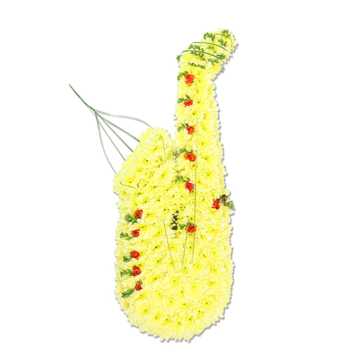A large, saxophone-shaped floral arrangement commands attention against a bright white background, its form immediately recognisable in spite of being entirely made from flowers and foliage. The main structure is paved with scores of small yellow chrysanthemums, each bloom carefully placed so that the petals overlap and create a continuous, cushion-like surface. This rich yellow covering traces the full outline of the instrument, from the mouthpiece at the top down the sweeping neck and long body to the flared bell that opens outward at the base. Nestled into the yellow base, small red spray roses and rosebuds are dotted along the length of the saxophone, placed thoughtfully to echo the keys, buttons, and subtle mechanisms that give the instrument its character. Fine strands of deep green foliage, possibly ivy or trailing grass, run along the edges and curve into the body, giving depth and realism, and suggesting the shadows and contours you'd see on polished brass. Discreet silver wires and supports occasionally peek through near the top, hinting at the internal frame that holds the tribute upright, like the unseen craftsmanship behind a beautiful performance. The background is clean and uncluttered, so the rich colours and textures feel almost luminous. This bespoke piece would be perfectly at home at a Cranford memorial service, perhaps honouring a loved one who played in local bands or filled homes around the High Street and Cranford Park with music. The combination of joyful yellow and heartfelt red speaks of shared memories, late-night tunes, and the enduring comfort of a favourite melody carried on in those left behind.
